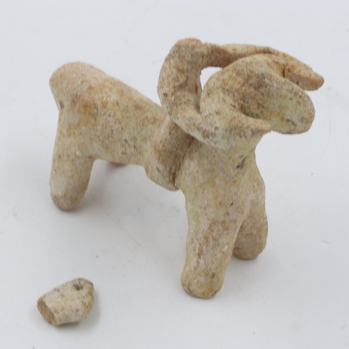 268 - Han Dynasty clay figure of a mounted horseman, head detached but present, L: 10 cm. UK P&P Group 1 (... 