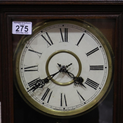 275 - Waterbury (USA) wall clock, original labels on back, H: 85 cm.  Not available for in-house P&P