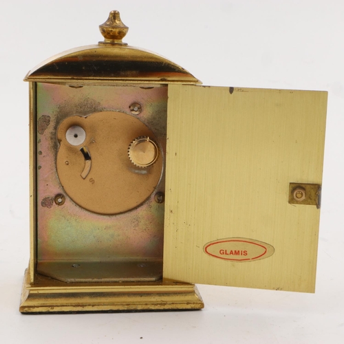 283 - Miniature mechanical brass table clock, H: 80 mm. UK P&P Group 2 (£20+VAT for the first lot and £4+V... 