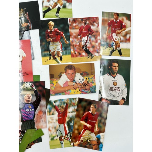 2043 - Collection of mixed Manchester United Football Club pictures, some are signed. and a signed copy of ... 