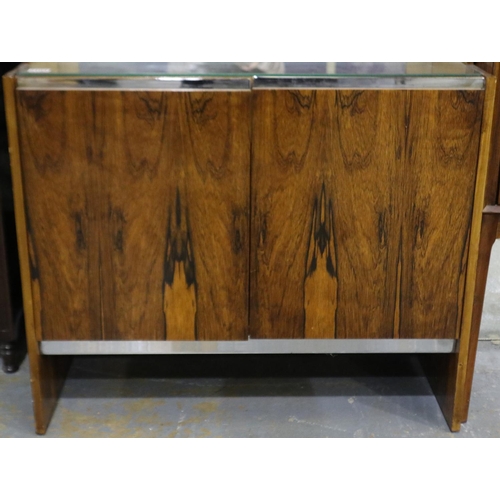 2104 - Richard Young for Merrow Associates rosewood drinks cabinet having four cupboard doors, two internal... 