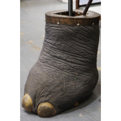 2069 - A large taxidermic elephants foot, later converted to a stick stand mounted in copper H:47cm interio... 