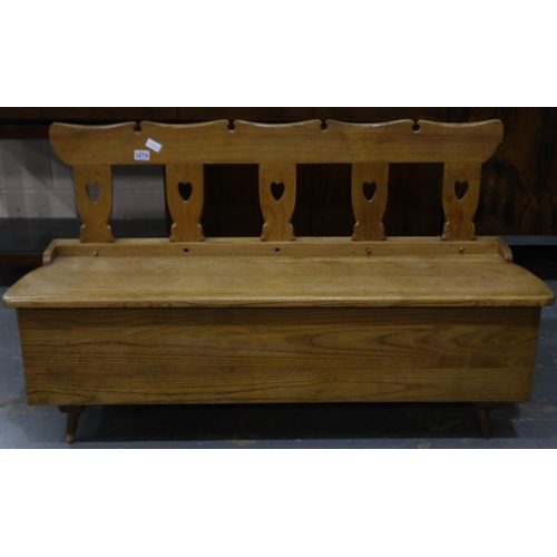 2078 - An early 20th century golden oak bench, box seat with hinged lid, 132x44x76cm H. Not available for i... 