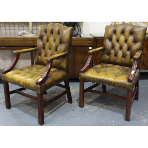 2085 - A pair of 20th century leather desk chairs in the chesterfield style. Not available for in-house P&P