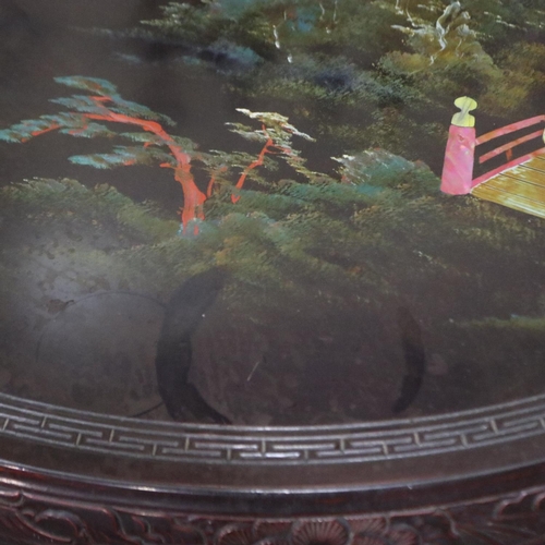 2087 - A mid 20th century Oriental centre table, top painted and inlaid with mother of pearl D:75 H:32cm so... 