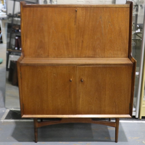 2112 - Dalescraft for Heals mid 20th century teak bureau with fitted fall front and two door cupboard base,... 