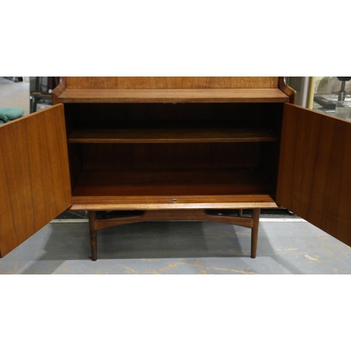 2112 - Dalescraft for Heals mid 20th century teak bureau with fitted fall front and two door cupboard base,... 