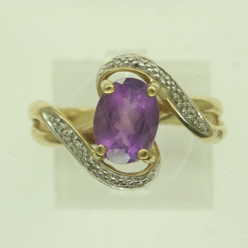 11 - 9ct gold amethyst and diamond crossover ring, size P, 3.4g. UK P&P Group 0 (£6+VAT for the first lot... 