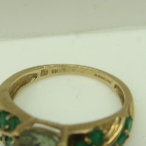 25 - 9ct gold ring set with emeralds and topaz, size O, 3.7g. UK P&P Group 0 (£6+VAT for the first lot an... 