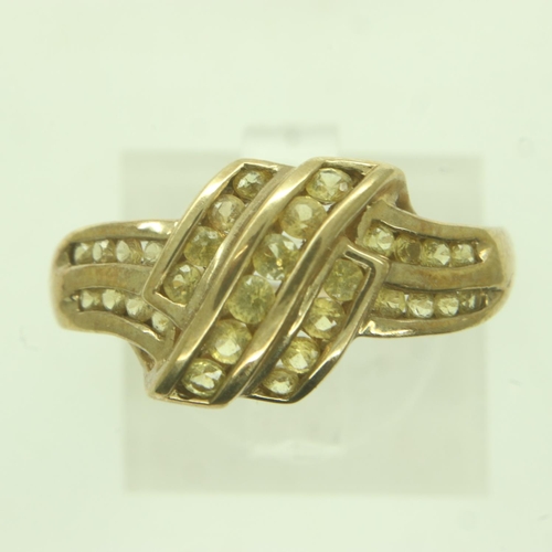 27 - 9ct gold diamond set crossover ring, size P, 2.8g. UK P&P Group 0 (£6+VAT for the first lot and £1+V... 