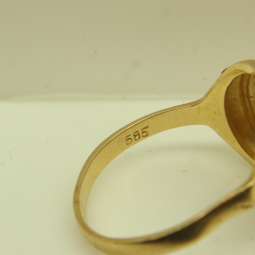 30 - A 14ct gold ring, set with a 22ct gold Mexican traditional wedding token dated 1865, shank mis-shape... 