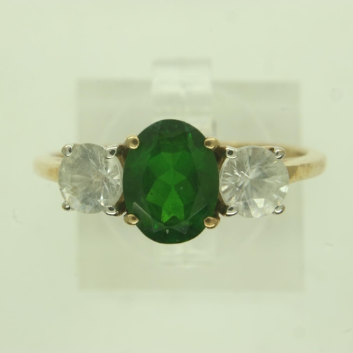 31 - 10ct gold white topaz and emerald set trilogy ring, size S, 2.8g. UK P&P Group 0 (£6+VAT for the fir... 