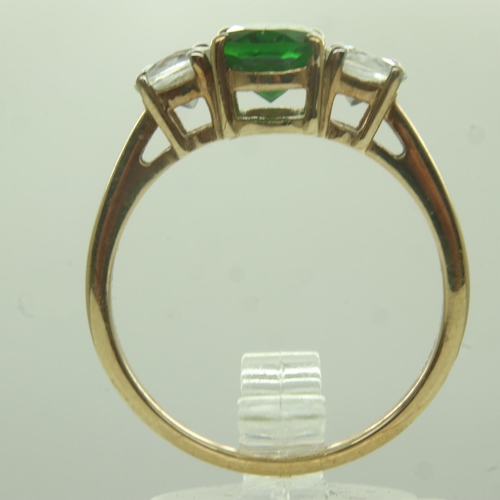 31 - 10ct gold white topaz and emerald set trilogy ring, size S, 2.8g. UK P&P Group 0 (£6+VAT for the fir... 