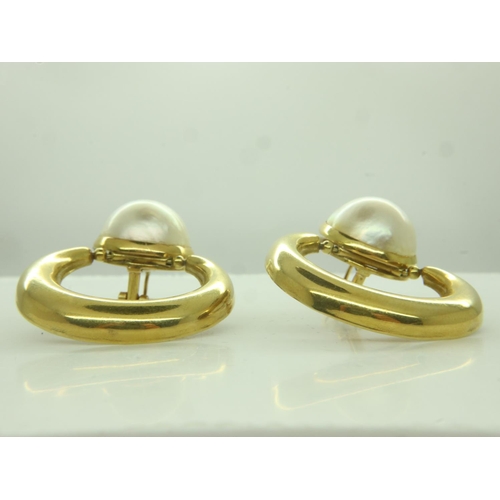 34 - A pair of 18ct gold crescent earrings, each set with a large domed circular baroque pearl, drop L: 4... 