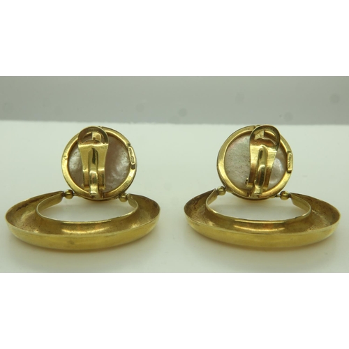 34 - A pair of 18ct gold crescent earrings, each set with a large domed circular baroque pearl, drop L: 4... 