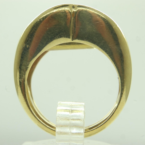 46 - A wide profile 18ct gold ring, set with a large channel-set faceted citrine, size M, 10.7g. Small ch... 