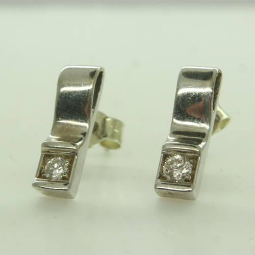 60 - A pair of 9ct white gold diamond-set earrings, combined 1.9g. UK P&P Group 0 (£6+VAT for the first l... 