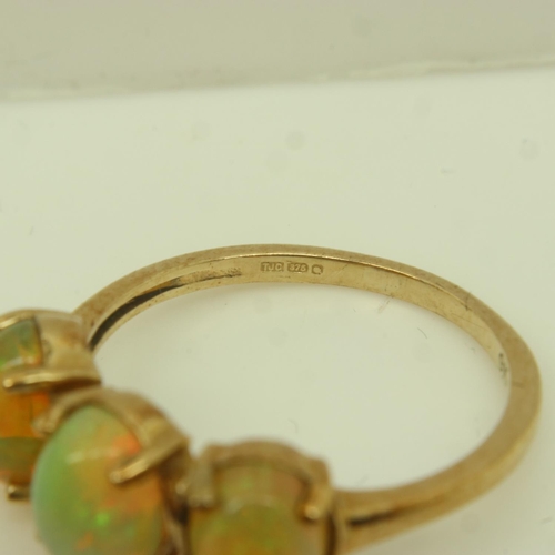 67 - 9ct gold trilogy ring set with three opals, 1.9g, size L. UK P&P Group 0 (£6+VAT for the first lot a... 