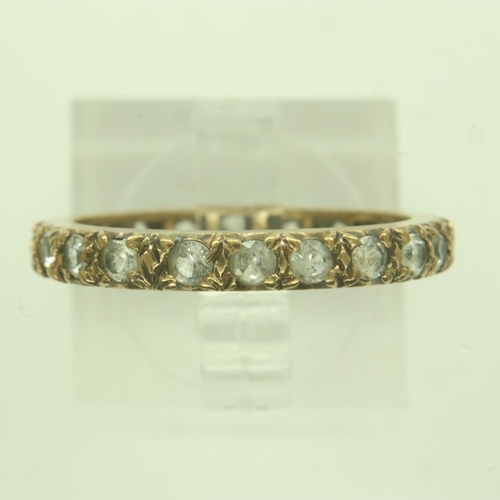 72 - 9ct gold stone set eternity ring, unmarked, size N, 2.2g. UK P&P Group 0 (£6+VAT for the first lot a... 