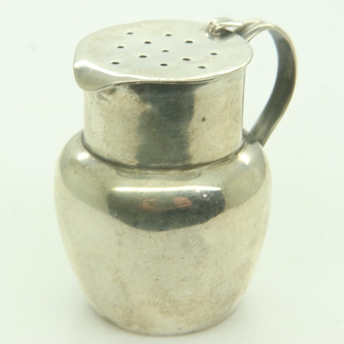 115 - A Chester hallmarked silver jug-form pepperette, 1895, H: 60 mm. UK P&P Group 0 (£6+VAT for the firs... 