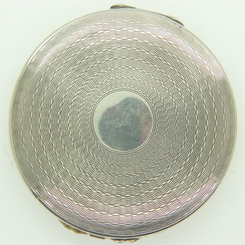 116 - A hallmarked silver circular powder compact, Birmingham assay, 71g. UK P&P Group 1 (£16+VAT for the ... 