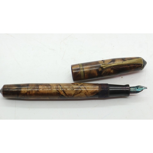 126 - The Unique Fountain Pen, with a 14ct gold nib. UK P&P Group 1 (£16+VAT for the first lot and £2+VAT ... 