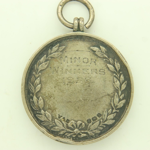 152 - LIVERPOOL COUNTY FOOTBALL ASSOCIATION: a hallmarked silver and gold washed Minor Winners 1925 fob. U... 