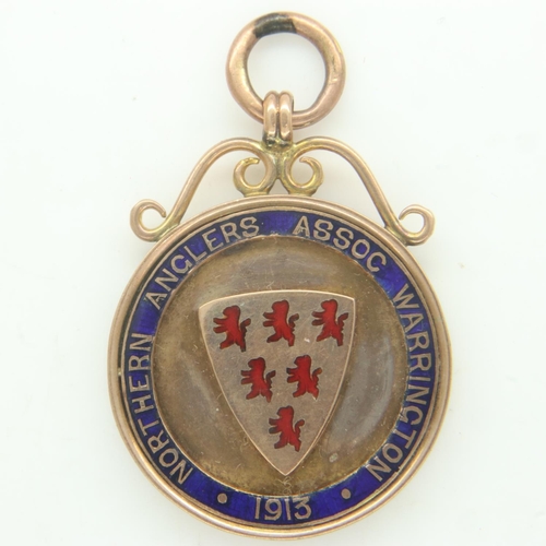 153 - NORTHERN ANGLERS ASSOCIATION (WARRINGTON): an enamelled 9ct gold fob dated 1913, total 7.7g. UK P&P ... 