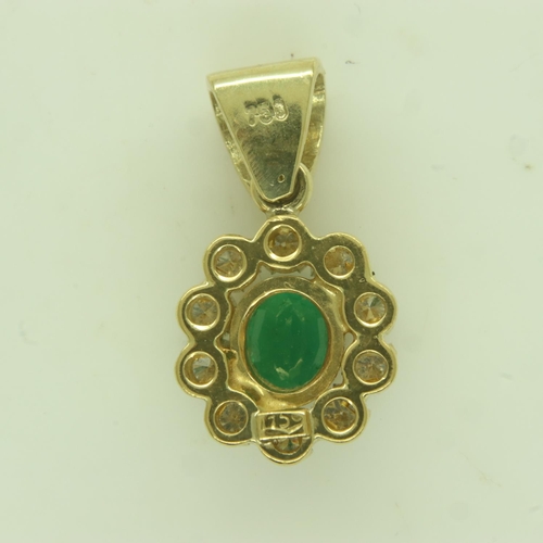 79 - 18ct gold pendant, set with an oval-cut emerald surrounded by ten diamonds, 3.3g. UK P&P Group 0 (£6... 