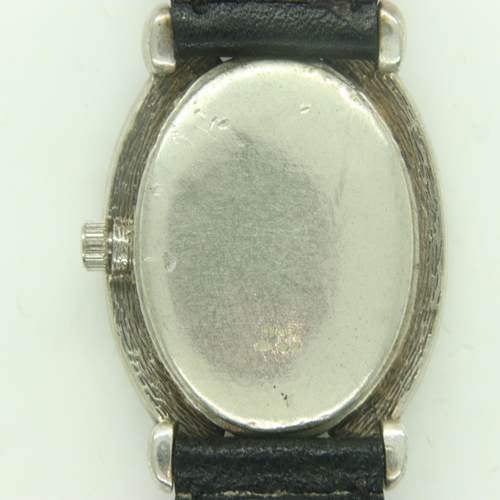 94 - LE CHAT: ladies silver cased wristwatch, with pearlescent oval dial, requires battery. UK P&P Group ... 