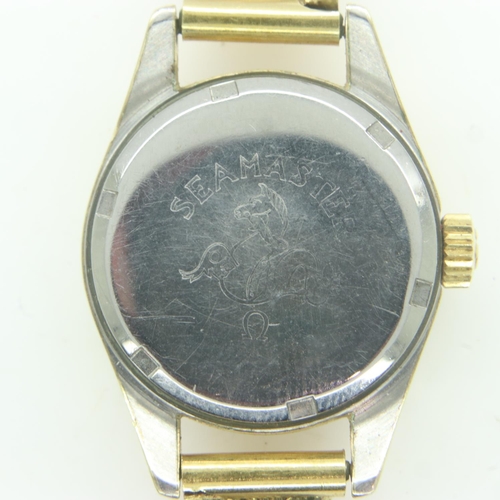 95 - OMEGA: Seamaster ladies wristwatch, gold-plated steel case on an 18ct gold bracelet, champagne circu... 