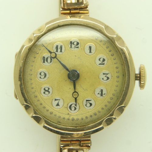 98 - 9ct gold ladies wristwatch, on a 9ct gold expanding bracelet. UK P&P Group 1 (£16+VAT for the first ... 