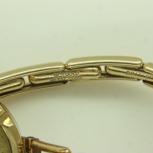 98 - 9ct gold ladies wristwatch, on a 9ct gold expanding bracelet. UK P&P Group 1 (£16+VAT for the first ... 