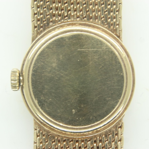 99 - OMEGA: 9ct gold cased ladies wristwatch wristwatch on a 9ct gold bracelet, 27.3g, working at lotting... 