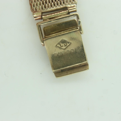 99 - OMEGA: 9ct gold cased ladies wristwatch wristwatch on a 9ct gold bracelet, 27.3g, working at lotting... 