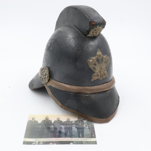 163 - Early Fireman's helmet, formerly property of Mr George Farimond, Greenall Whitley fire brigade, with... 