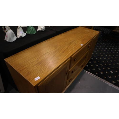 2122 - Ercol Blonde elm sideboard, of three drawers flanked by two single cupboards, 156 x 49 x 69 cm H. No... 