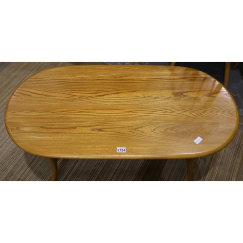 2124 - A modern Ercol blonde elm oval centre table, 115 x 59 x 48 cm H. Not available for in-house P&P