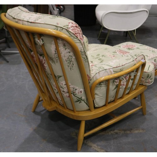 2125 - An Ercol blonde elm framed lounge chair, with an Ercol footstool upholstered in matching fabric. Not... 