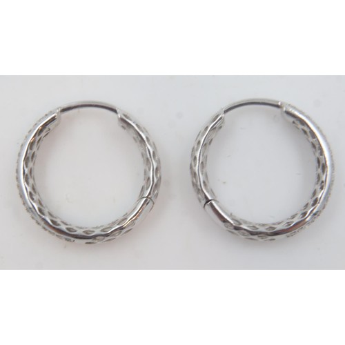 83 - 18ct white gold diamond set hoop earrings, 3.8g. UK P&P Group 0 (£6+VAT for the first lot and £1+VAT... 