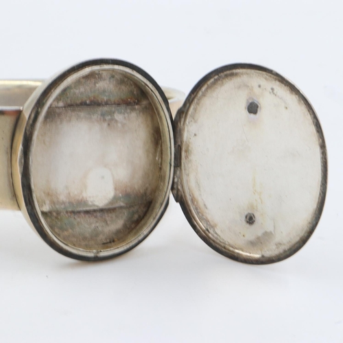 63 - ***WITHDRAWN***Enamelled white metal bangle with incorporated locket. UK P&P Group 1 (£16+VAT for th... 