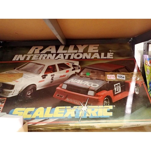 1054 - Scalextric Rallye International in original box, appears complete. Not available for in-house P&P