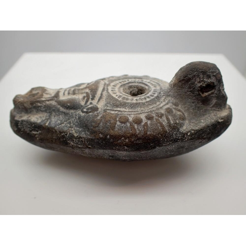1081 - Oil lamp in the form of North African Roman pottery. UK P&P Group 1 (£16+VAT for the first lot and £... 