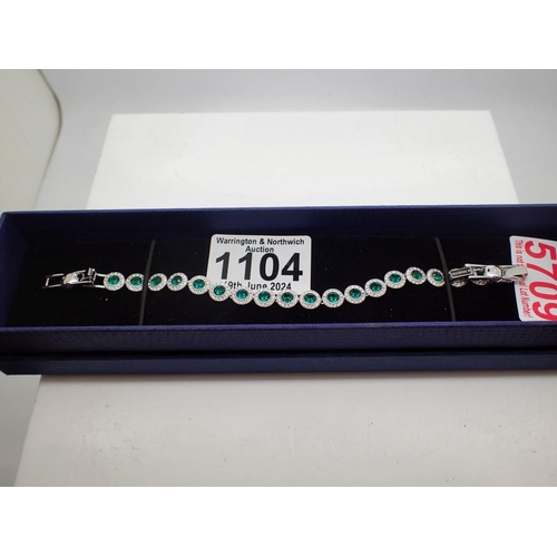 1104 - Swarovski boxed green stone set bracelet. UK P&P Group 1 (£16+VAT for the first lot and £2+VAT for s... 
