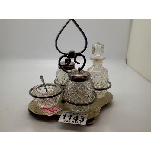 1143 - Silver plated and glass cruet set with hallmarked silver tops. UK P&P Group 1 (£16+VAT for the first... 
