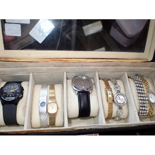 1154 - Watch display box containing mixed ladies and gents dress wristwatches. UK P&P Group 2 (£20+VAT for ... 