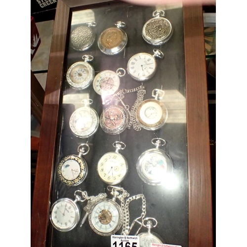1165 - Fifteen modern pocket watches mounted in a frame. Not available for in-house P&P