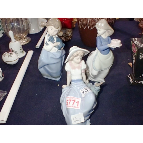 1329 - Three Nao figurines. UK P&P Group 2 (£20+VAT for the first lot and £4+VAT for subsequent lots)