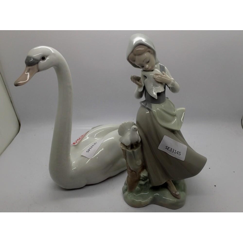 1349 - Lladro swan and a Lladro girl feeding a dove. UK P&P Group 2 (£20+VAT for the first lot and £4+VAT f... 