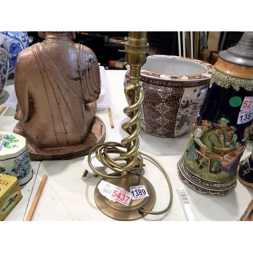 1389 - Brass lamp with twist base. All electrical items in this lot have been PAT tested for safety and hav... 